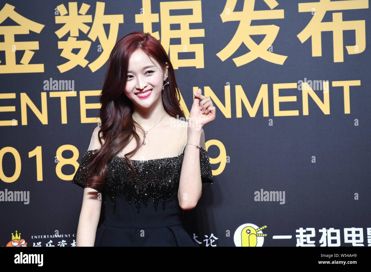 Chinese singer Wu Xuanyi of South Korean-Chinese girl group Cosmic Girls attends the Golden Data Entertainment Award 2018-2019 in Beijing, China, 20 J Stock Photo