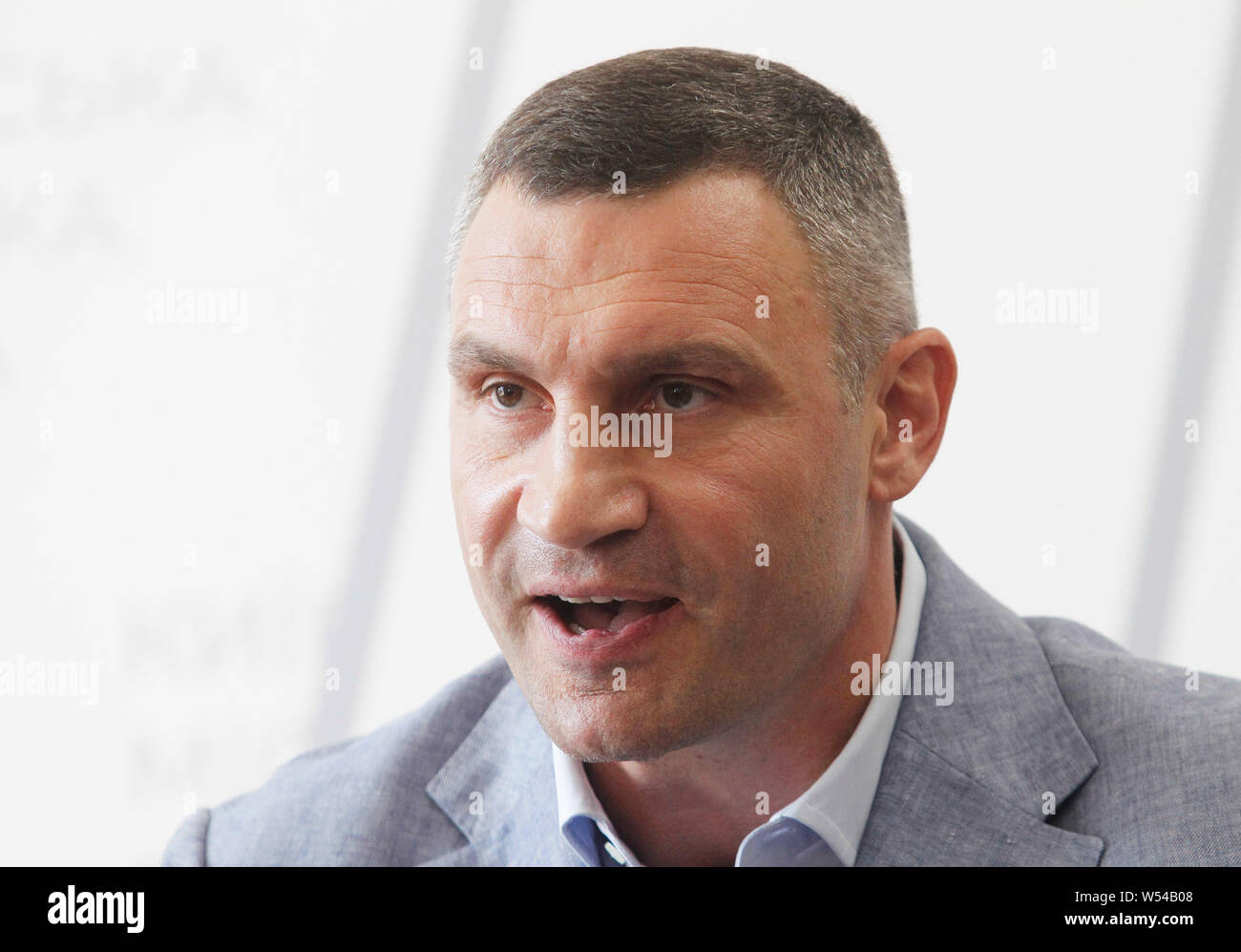 Kiev, Ukraine. 26th July, 2019. Mayor and former heavyweight boxing champion Vitali Klitschko speaks during a press conference in Kiev.Andriy Bohdan, Head of Ukrainian President Volodymyr Zelensky Presidential Office, sent a letter to Minister of the Cabinet Oleksandr Saenko asking him to submit a motion to dismiss Vitaliy Klitschko as head of Kyiv City State Administration, as local media reported. Credit: SOPA Images Limited/Alamy Live News Stock Photo