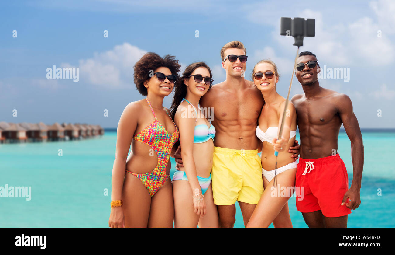 happy friends taking selfie on summer beach Stock Photo