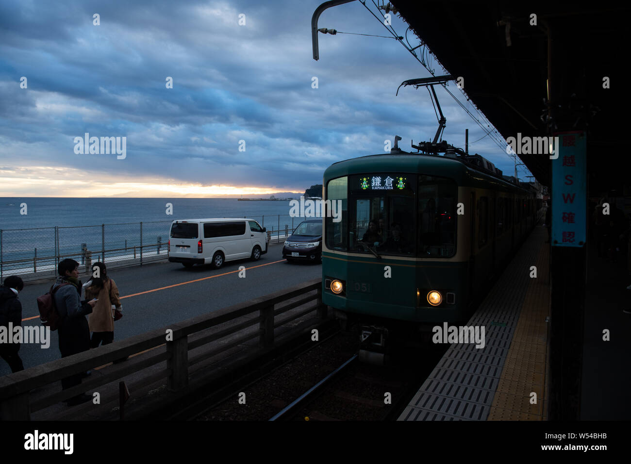 A train on the Enoden Line enters the Kamakura-Koko-Mae Station by the ...