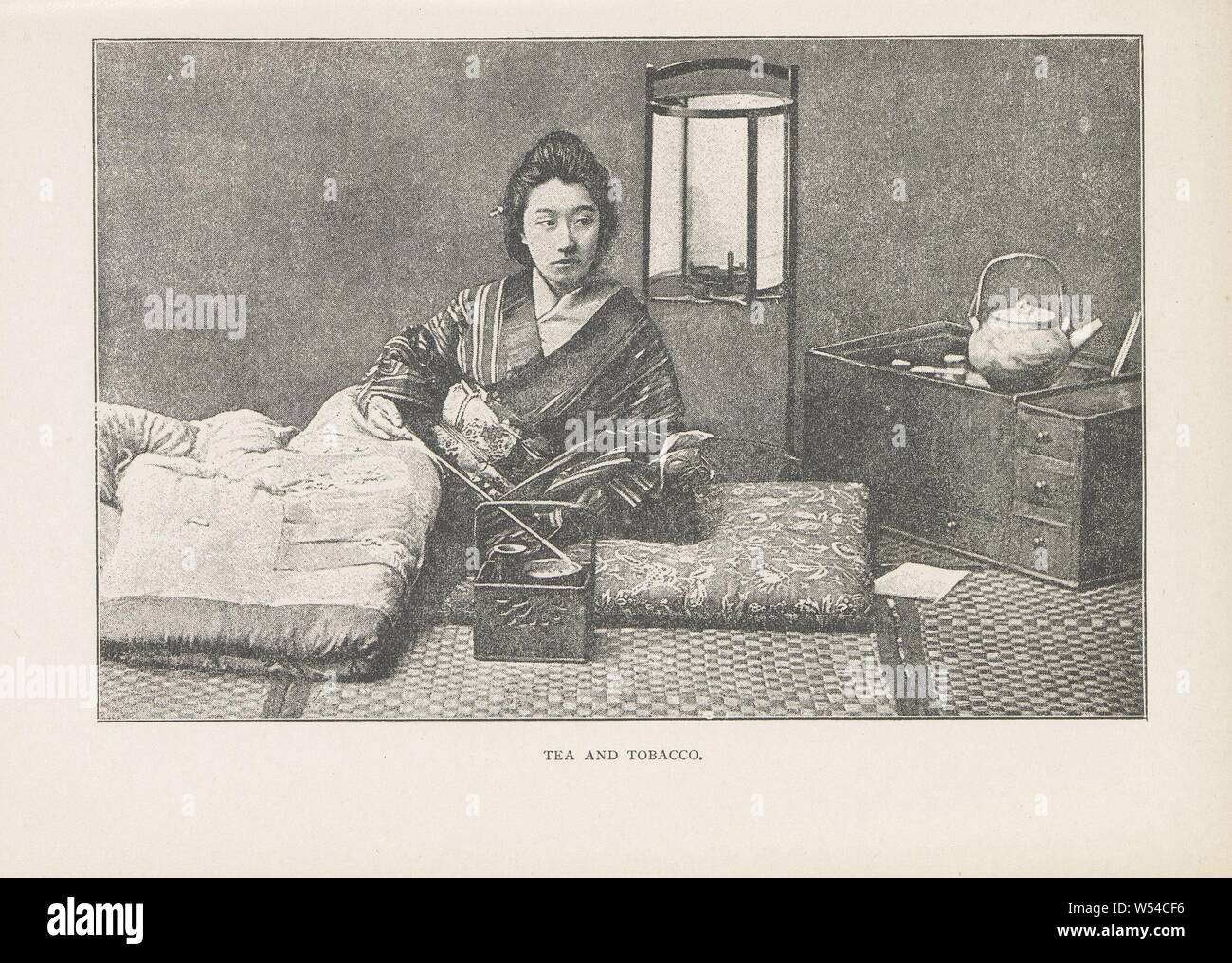 Portrait of an unknown Japanese woman sitting with tea and tobacco Tea and tobacco (title on object), adult woman, cup of tea, tobacco, anonymous, Japan, c. 1882 - in or before 1892, paper, h 99 mm × w 152 mm Stock Photo