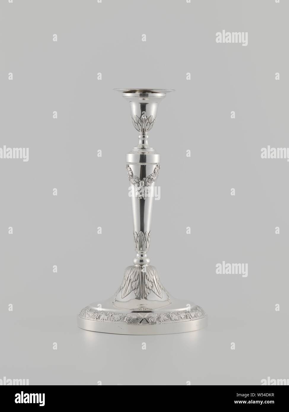 Candlestick, Candlestick with base. Marked and dated, foliage, ornament, vine, Isaac Jean Alexandre Gogel, Francois Marcus Simons, The Hague, 1803, silver (metal), founding, h 29.5 cm × w 16.5 cm × l 11.3 gr × w 486.0 Stock Photo