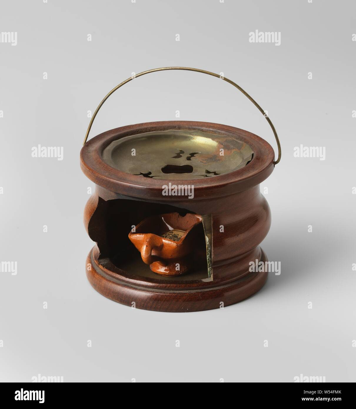 Mahogany Wood Stove With Pottery Fire Test Round Mahogany Wood Stove The Interior Plate And Handle Are Made Of Yellow Copper The Fire Test Is Made Of Red Earthenware Anonymous Netherlands Possibly