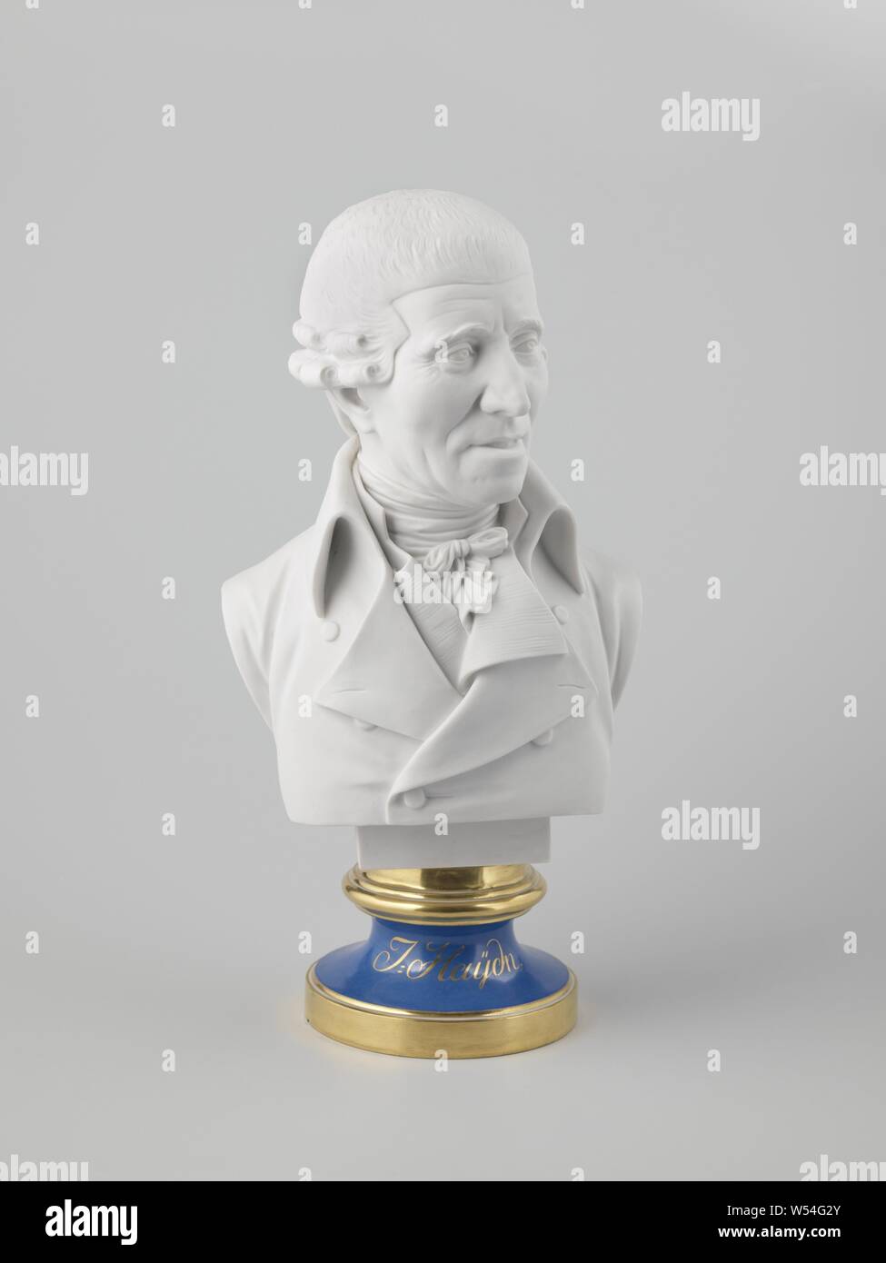 Portrait of Joseph Haydn, Porcelain bust on a round base. The portrait representing Joseph Haydn (1732-1809) is in biscuit and the pedestal is covered with blue and gold on the glaze. Marked on the bottom with the shield, number 59 and year number 805., Kaiserliche Porzellanmanufaktur, Vienna, 1805, porcelain (material), glaze, gold (metal), vitrification, h 40.7 cm × w 20.4 cm × d 14 cm Stock Photo