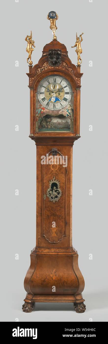 Standing clock, Jan Hermelinck Amsterdam, Standing clock in oak cabinet  glued with walnut. The S-shaped used base rests on claw feet. The top and  bottom of the cabinet door has a diamond