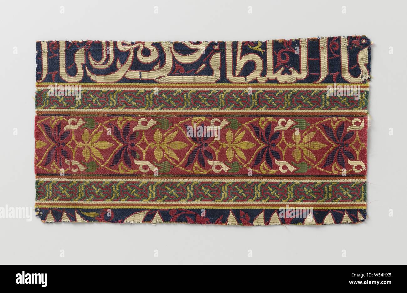 Fragment of lampas with multi-colored pattern in strips, Fragment with  multi-colored pattern in five strips, among others with stylized walking  tendril motif and an inscription in Arabic of which the translation reads: