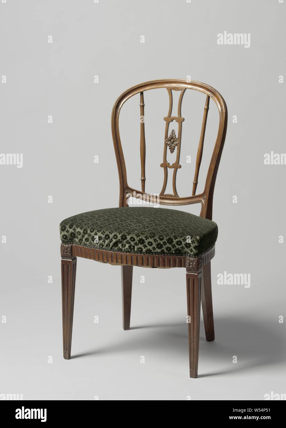 Furniture, mahogany chair, resting on square legs that narrow downwards and  bear acanthus rosettes on the houses. The hind legs give way backwards. The  open curved and profiled back has a narrow