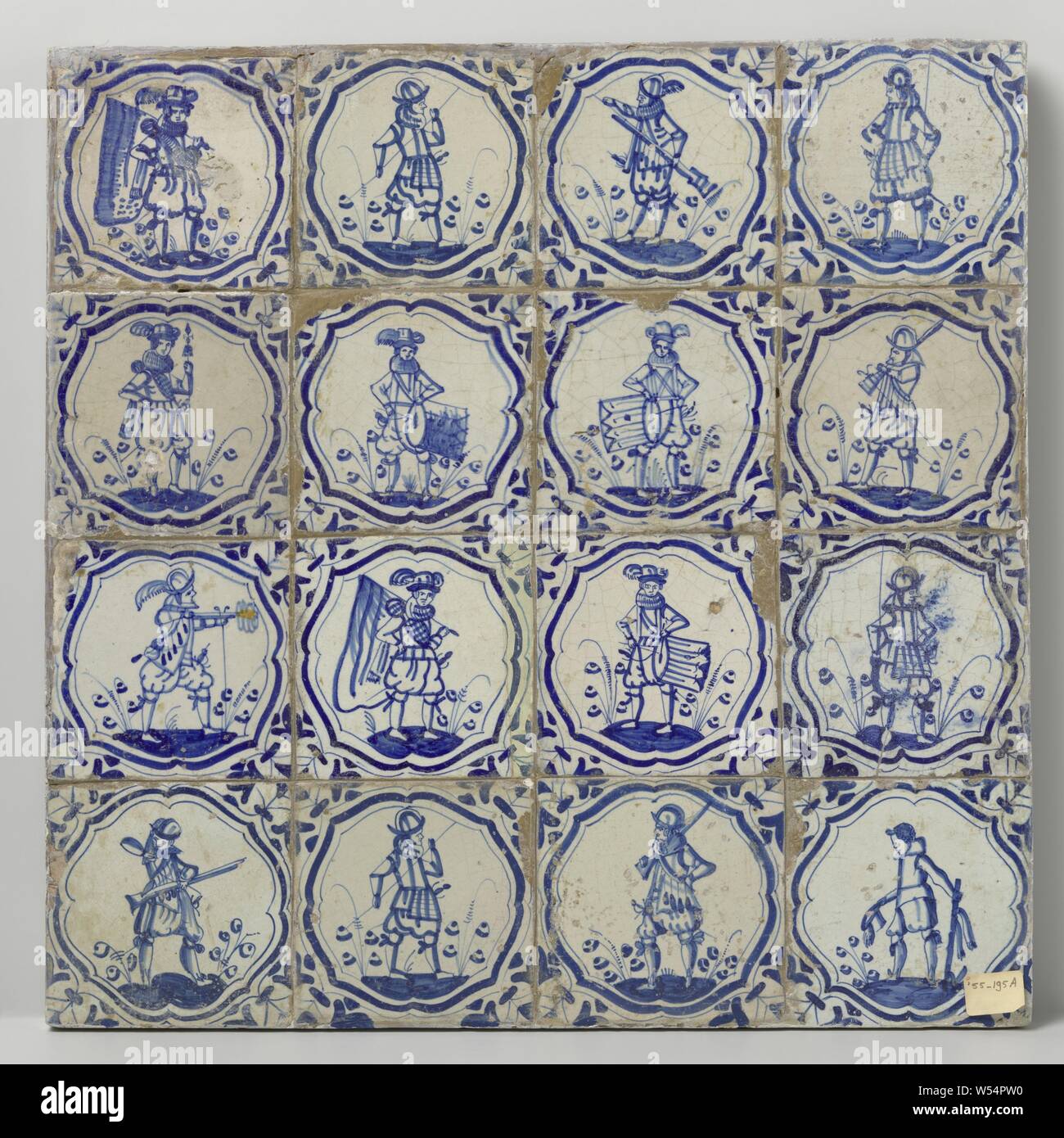 Field of sixteen tiles with soldiers, Field of sixteen tiles (4 x 4) each with a blue painted soldier on a floor inside an accolade with a wing blade in the corners., anonymous, Netherlands, c. 1620 - c. 1640, earthenware, tin glaze, h 52.5 cm × w 52 cm × d 3 cm Stock Photo