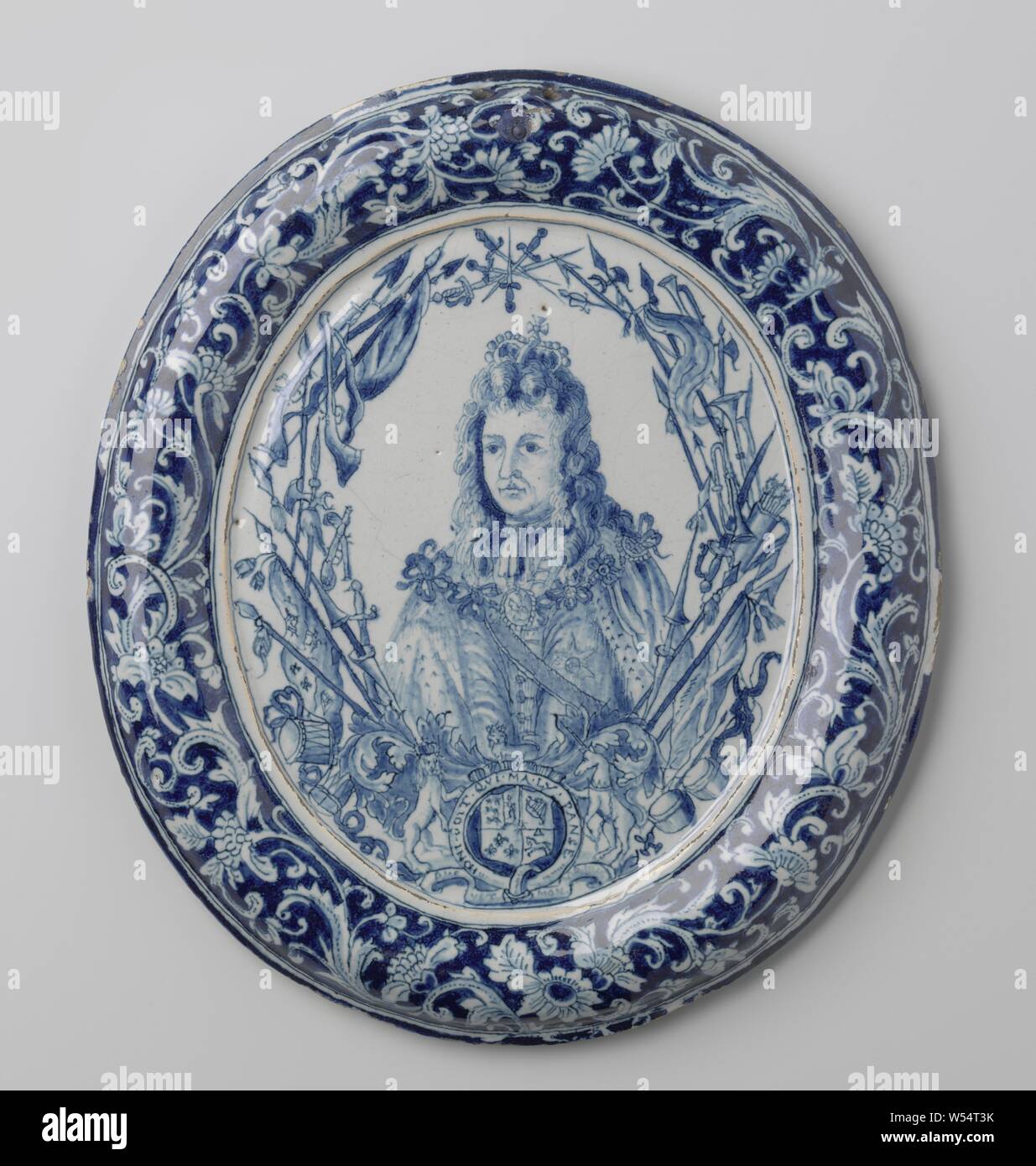 George I, King of England, Plaque of Faience. Painted blue with the portrait of George I, King of England (1714-1728). Possibly a fake after Dutch or English example. The object is (probably) a DECREASE, England, George I (King of Great Britain and Ireland), anonymous, Netherlands (possibly), 1720 - 1740 and/or 1830 - 1880, h 23.5 cm Stock Photo