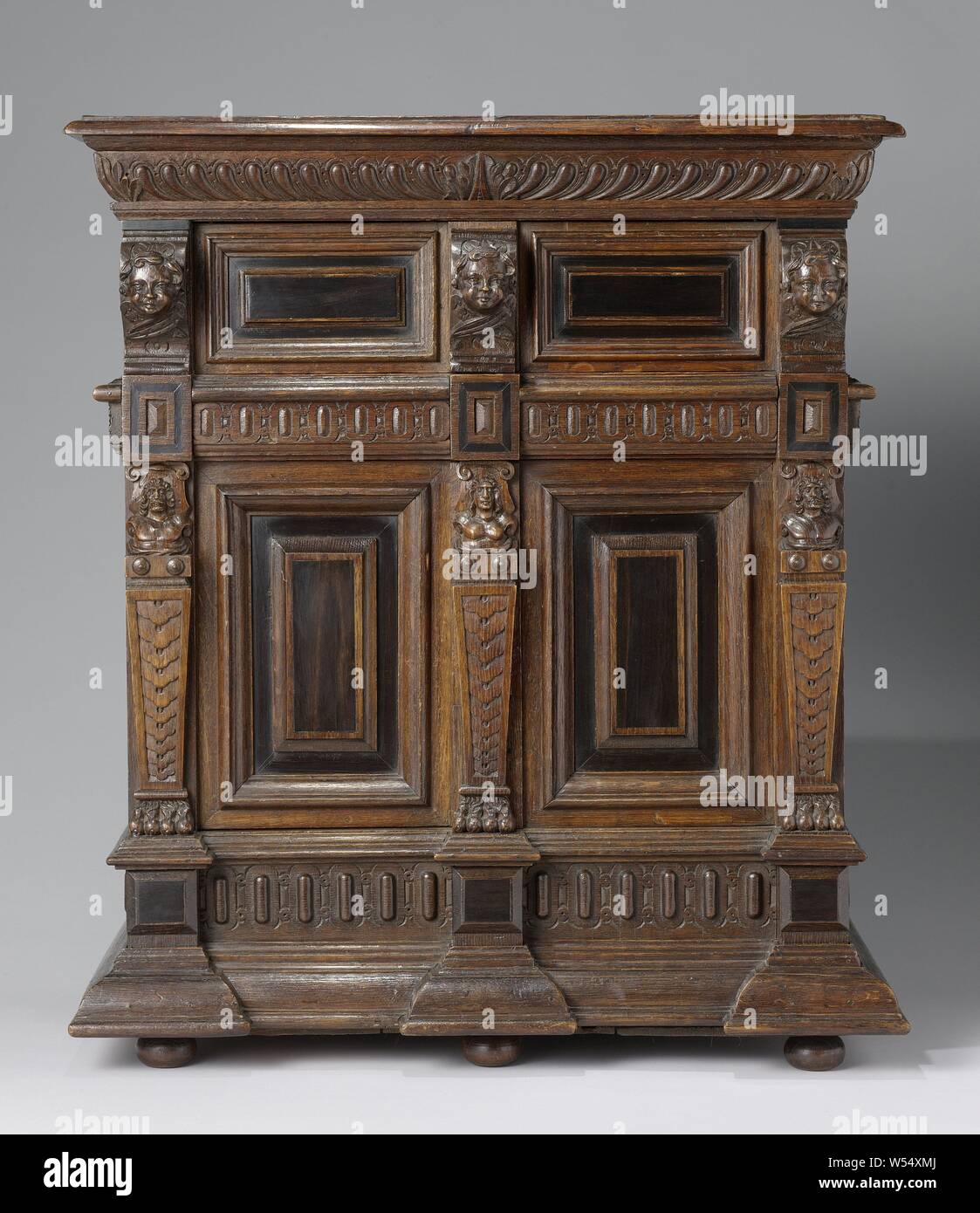Miniature cabinet in oak with two drawers between the doors in the top and  bottom cabinet, Miniature cabinet in oak, decorated with ebony. The high  lower cabinet and the lower upper cabinet