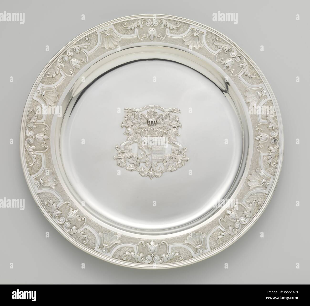 Communion set Supper dish, Supper dish of silver. The border is decorated with Louis XIV ornament borders. In the middle of the shelf is the appliqued weapon of Philippi Diodatie, armorial bearing, heraldry, Dirk Wor (attributed to), Dordrecht, 1736, silver (metal), d 33.5 cm Stock Photo