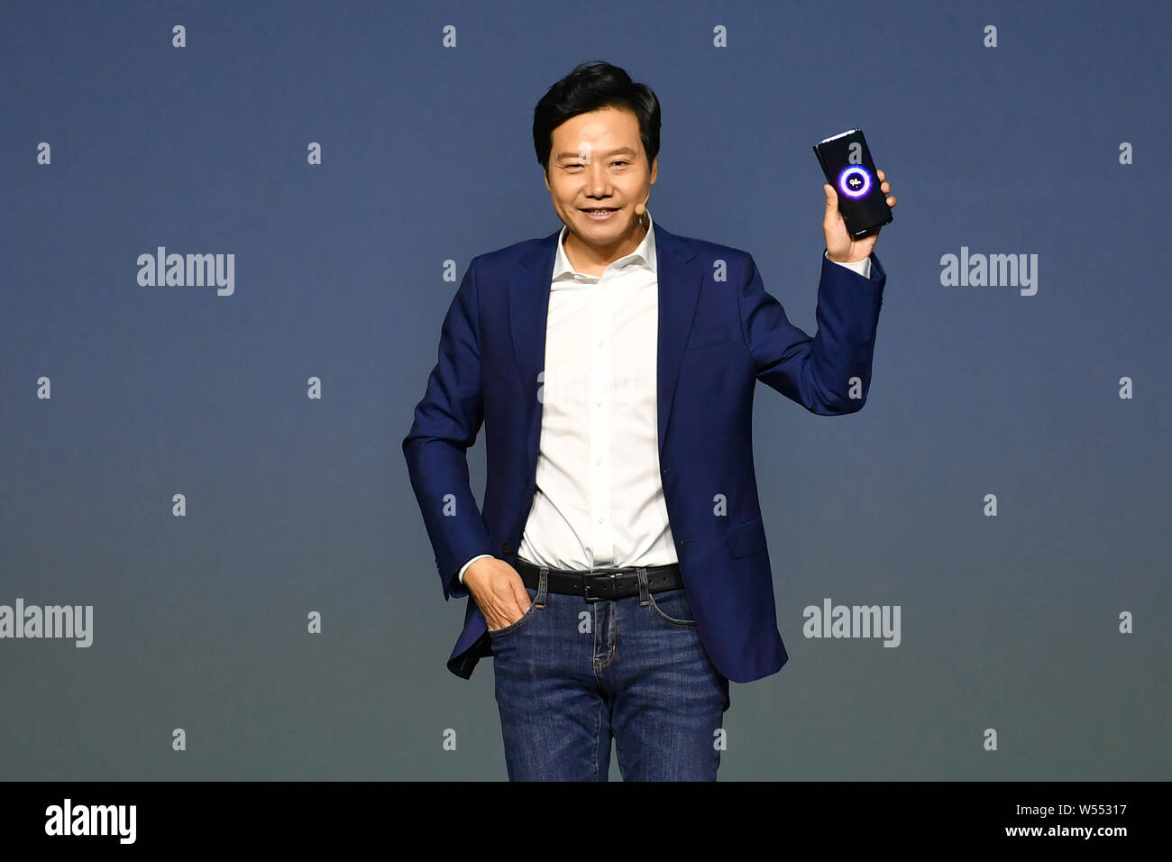 Lei Jun, Chairman and CEO of Xiaomi Technology and Chairman of Kingsoft Corp., introduces the Xiaomi Mi 9 smartphones during the new products launch e Stock Photo