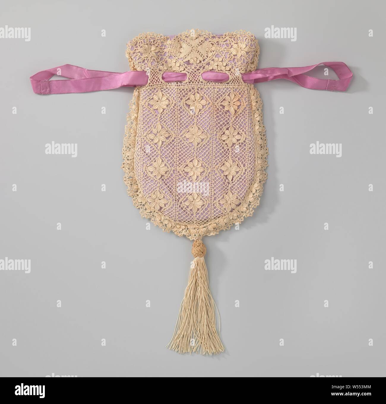 Reticule in a rounded shape of ecru colored lace consisting of a ...