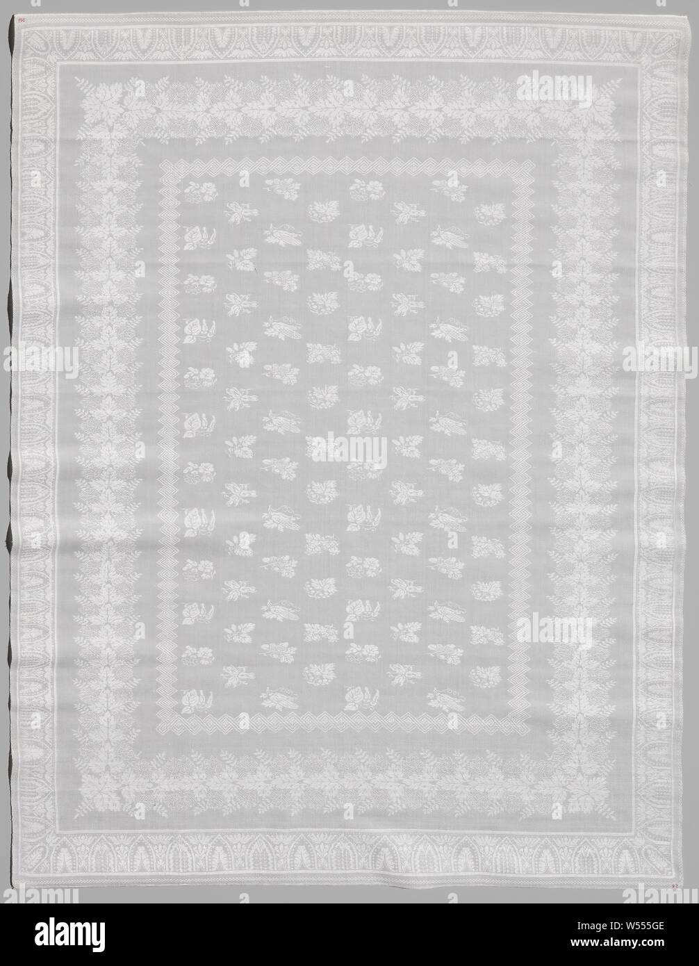 Napkin made of linen damask with a flower pattern, Napkin made of linen damask with scattered motifs and fruit branches arranged in the midfield. Running and lying edges, with 1: zigzag figures, 2: leaf pattern border contiguous, 3: closed floral border, 4: checkerboard motif. The napkin belongs to seven napkins and a tablecloth, Netherlands (possibly), c. 1800 - c. 1900, linen (material), damask, l 115.5 cm × w 86.0 cm Stock Photo