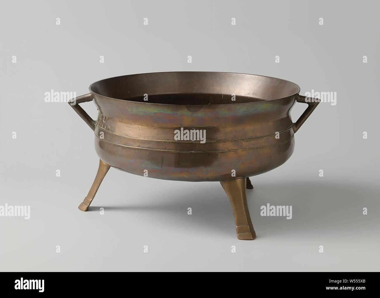Bronze cooking pot with watering can initials I.F.H. The pot, which is