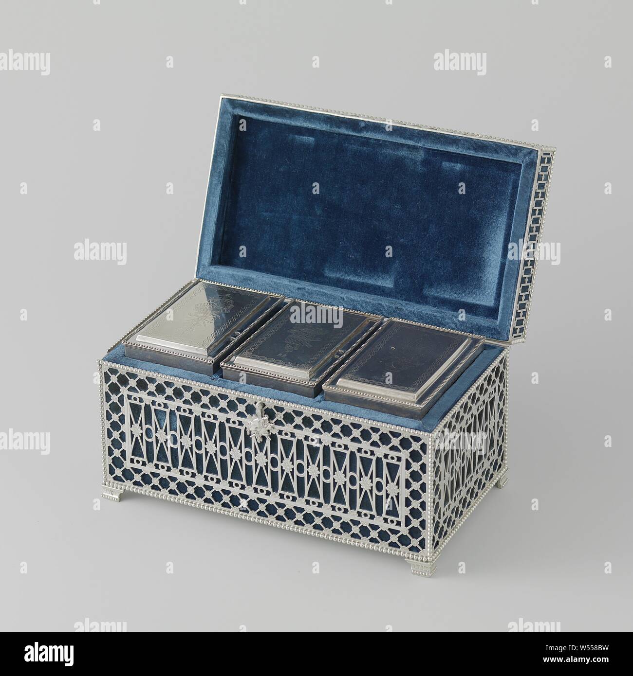 Tea chest Mixing can, Rectangular, silver mixing can, decorated with a graved fishing trophy with dead fish, a basket, skewers and a trap, ornaments, art, Pieter Adolf Bruné, Amsterdam, 1785, silver (metal), wood (plant material), engraving,  × h 9.4 cm × w 11.0 cm × d 7.1 cm × w 360.0 Stock Photo