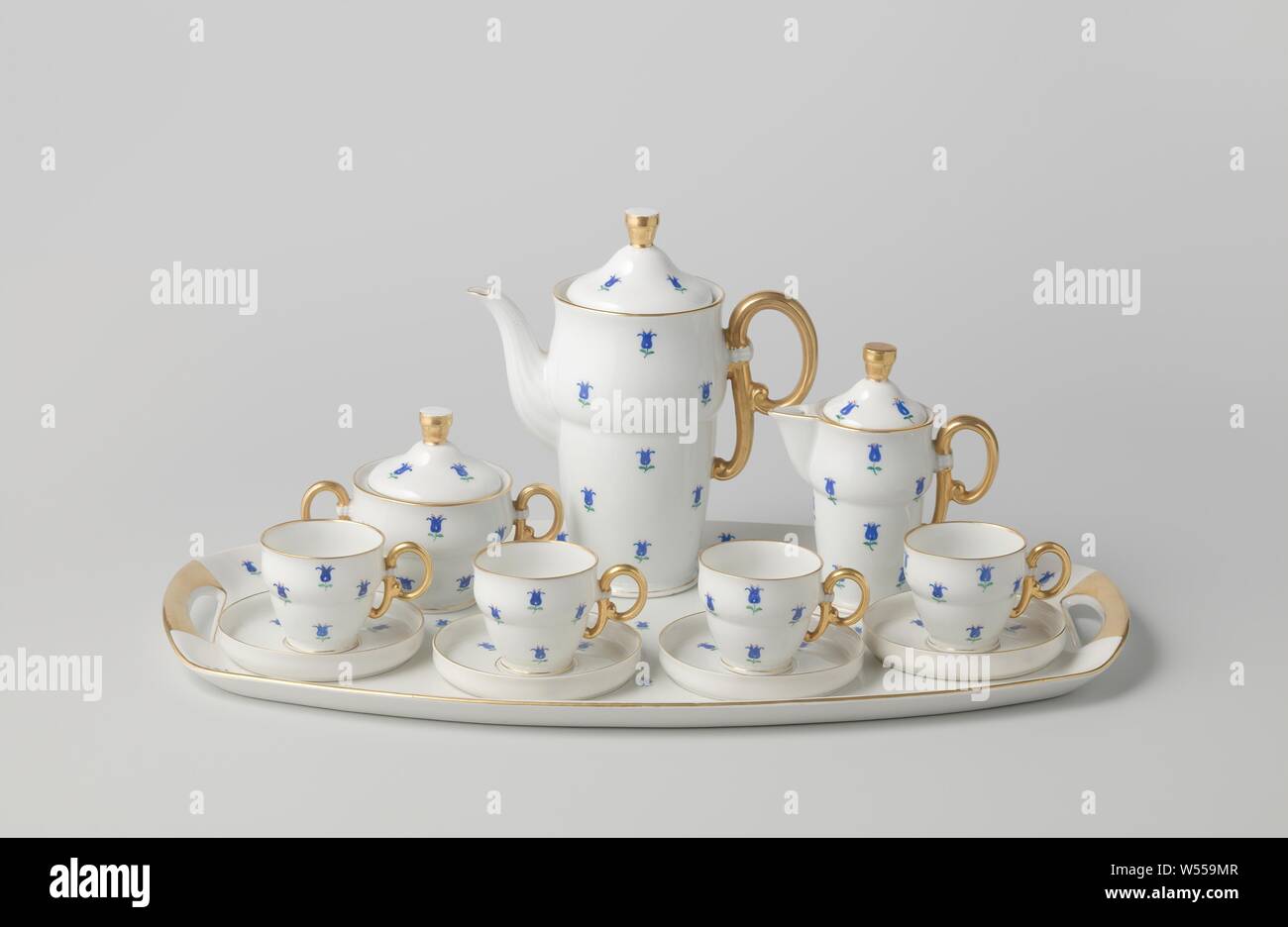 Coffee service with flowers, Porcelain coffee set, painted on the glaze in blue, red, green and gold. The service consists of twelve parts, including a tray, coffee pot, milk jug, sugar bowl and four cups with saucers. All decorated with blue flowers. Marked on the bottom with the crossed hammers with crown., Pirkenhammer, Karlovy Vary, c. 1935, porcelain (material), glaze, gold (metal), vitrification Stock Photo
