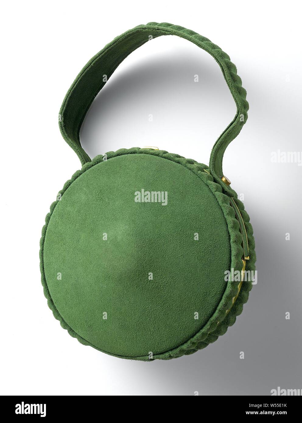Round handbag made of grass-green peau de suede with copper ring and  closure, Round bag made of grass-green peau de suede with copper ring and  closure. Model: The bag is made up
