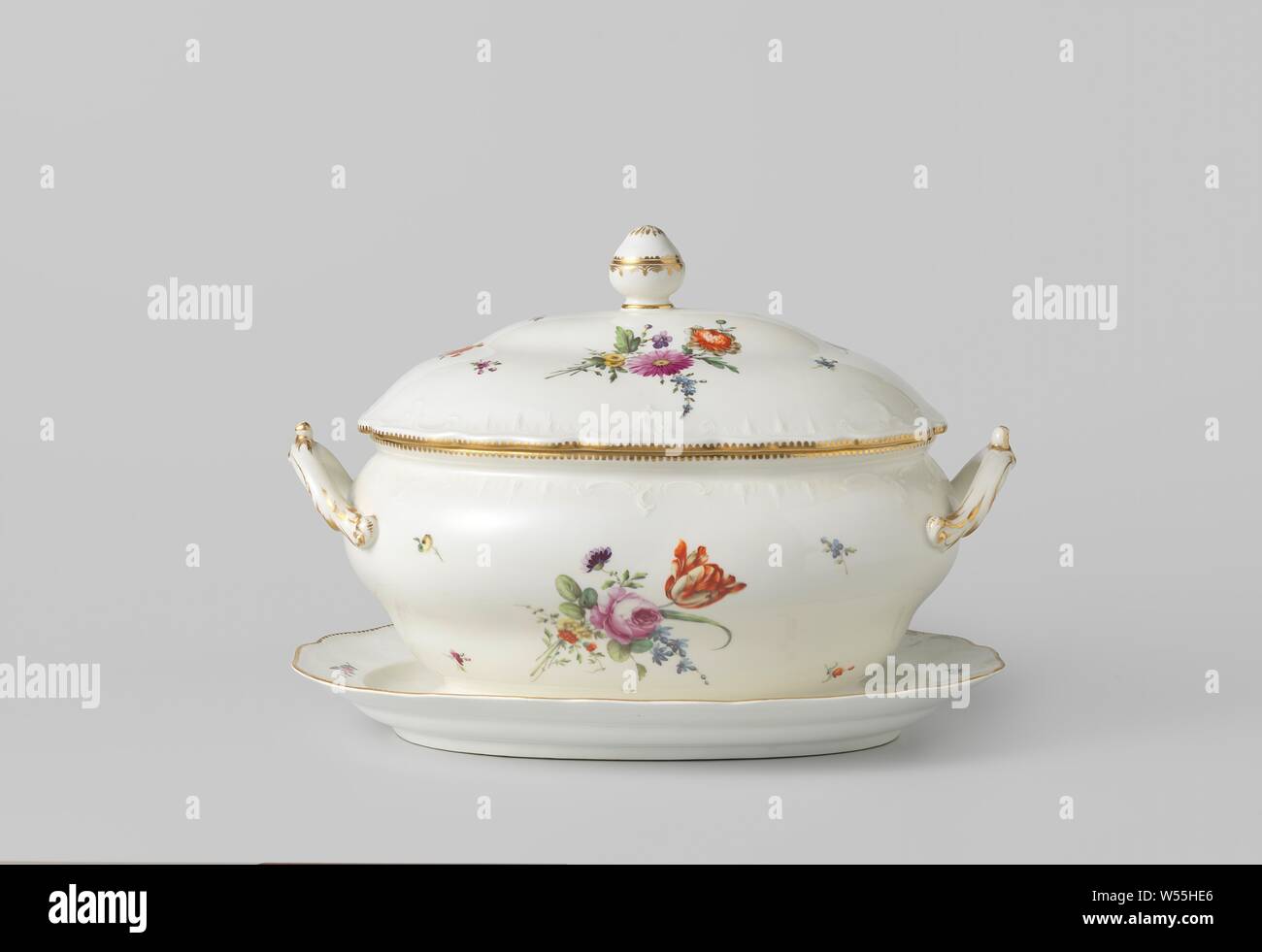 Soup tureen with lid and porcelain saucer, Soup tureen with lid on porcelain saucer. Painted with bouquets and scattered flowers. The walls are covered with rocaill motifs in gold. The ears of rocaille leaf shapes are placed in the longitudinal axis., Manufactuur Oud-Loosdrecht, Loosdrecht, c. 1774 - c. 1784, porcelain (material), h 26.1 cm h 14.5 cm × w 38 cm × d 24, h 11 cm × w 30.5 cm × d 21.5 cm h 4 cm × w 37 cm × d 25 cm Stock Photo