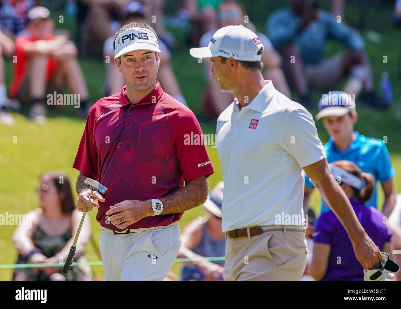 Memphis, TN, USA. 25th July, 2019. Bubba Watson, of the United States, talks with Adam Scott, of Australia, during the first round of the WGC-FedEx St. Jude Invitational golf tournament at TPC Southwind in Memphis, TN. Gray Siegel/Cal Sport Media/Alamy Live News Stock Photo