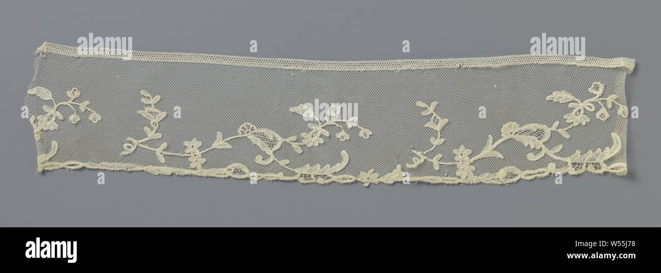 Strip of application side with mismatic twigs, Strip of natural-colored application side: bobbin lace appliqued on machine tulle. The pattern shows a row of mimosa branches waving to the right., anonymous, Belgium (possibly), c. 1890 - c. 1909, linen (material), l 42 cm × w 9 cm ×, 18.5 cm Stock Photo