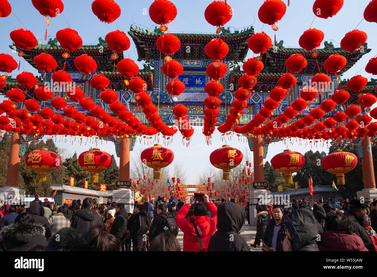 Tourists crowd the Ditan Park to attend a temple fair at Ditan Park during the Chinese Lunar New Year also known as Spring Festival in Beijing Chin Stock Photo Alamy