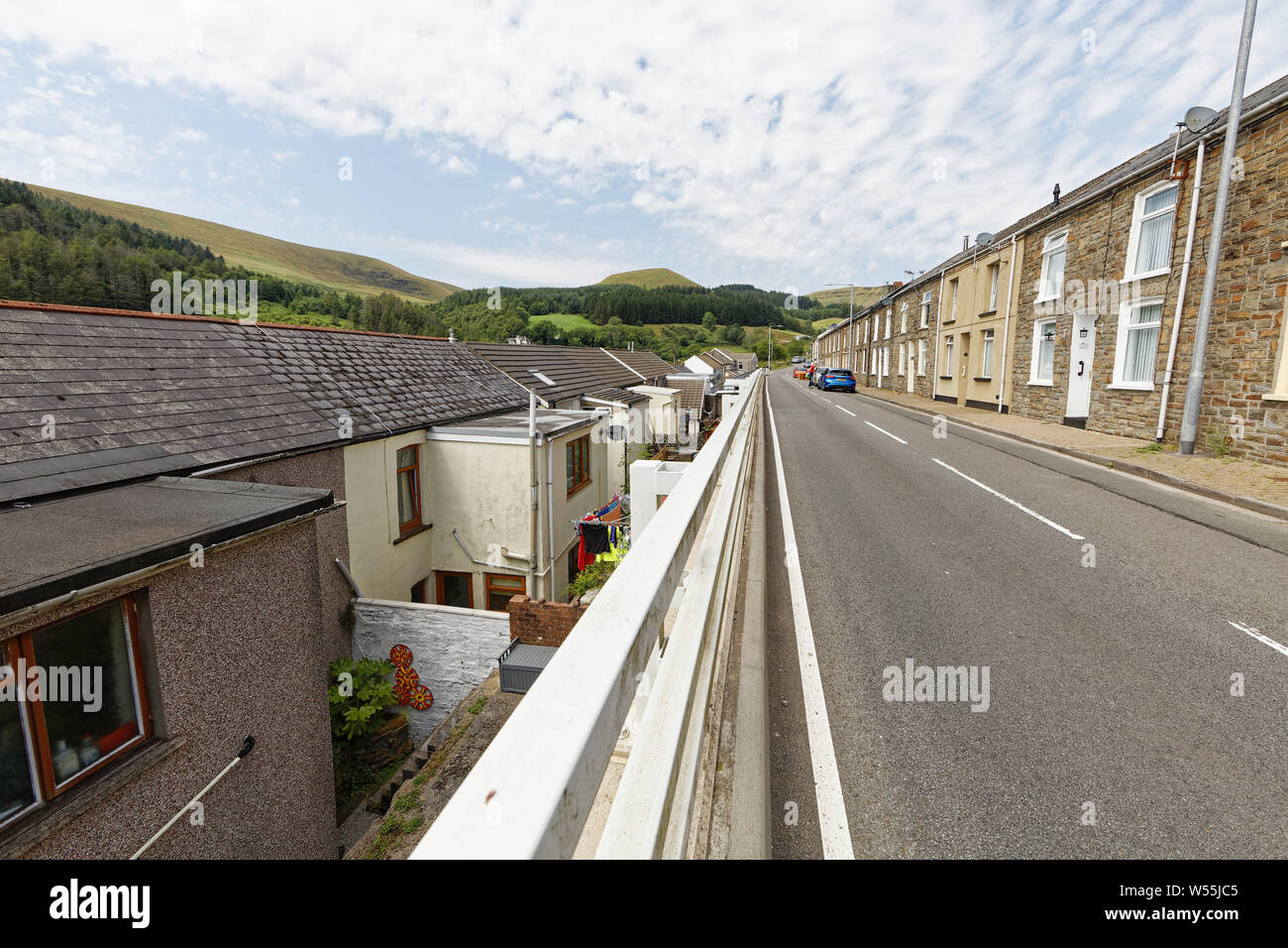 Streets of small former miners cottages in long rows in the valleys of south wales. Many being refurbished after the closing of all collieries. Stock Photo