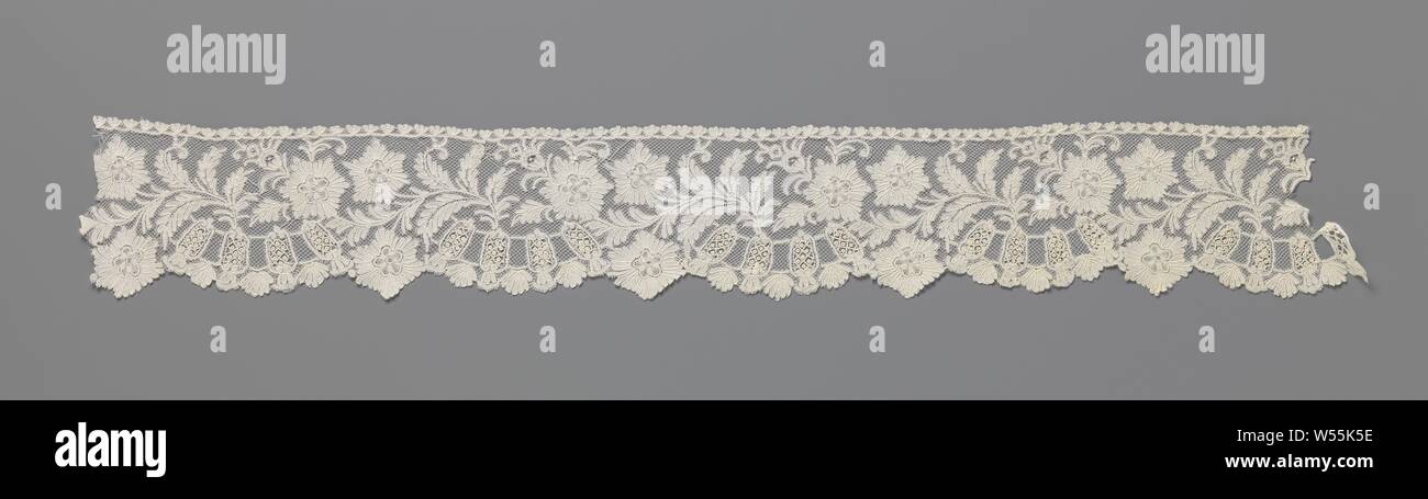 Strip of bobbin lace with goddess, A wavy branch with feathered leaves and  three star-shaped flowers growing from right to left. One of the flowers is  directed outwards and forms a small