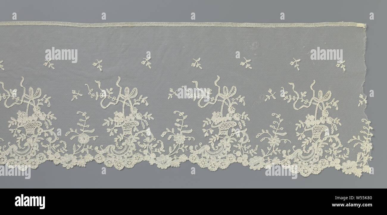 Applique lace with flower basket, Natural colored applique lace, spool lace with some details in needle lace appliqué on machine tulle. A stock that is empty on the inside is increasingly filled towards the edge of the debt. It is a running pattern of some twigs and openwork flower baskets (needle lace), the handle of which is very high and decorated with a bow with fluttering skirts. Large and small scallops with small and large roses form the scallops, from which a stiff branch rises and an S-shaped curved branch, which originates from an open-worked c-volute., anonymous, Belgium (possibly Stock Photo