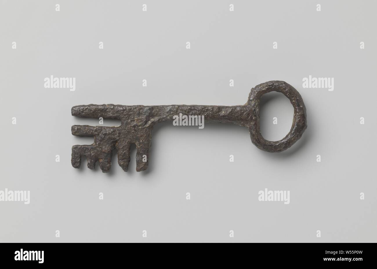 Key with deeply cut quadrangular beard, four-sided shaft and oval eye., c. 1500 - c. 1600, iron (metal), l 7.6 cm × w 2.3 cm Stock Photo