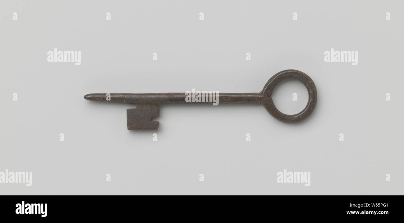 Key with a circular eye. The shaft extends past the beard at a point., c. 1600 - c. 1699, iron (metal), l 9.1 cm × w 2.2 cm Stock Photo
