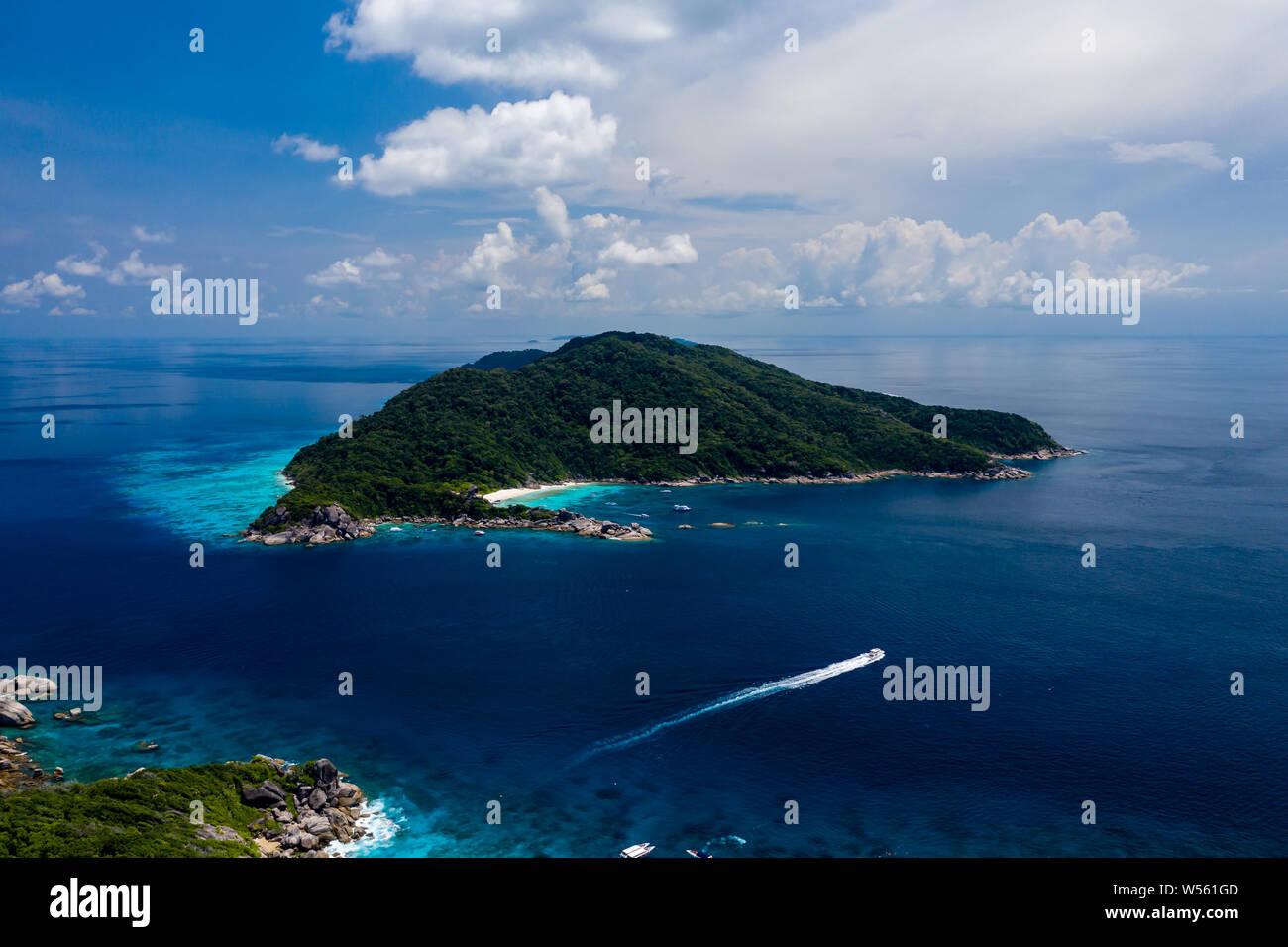 Aerial drone view of diving and snorkel boats around the beautiful tropical Similan Islands in Thailand Stock Photo