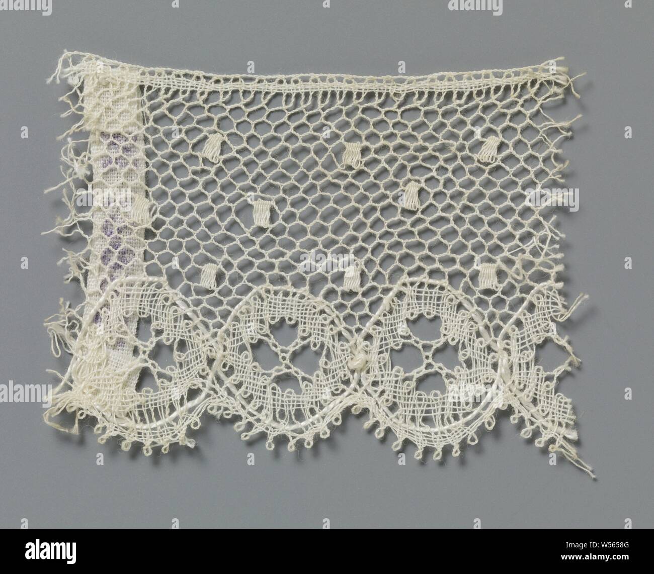 Strip of spool lace with concatenated circles along the underside ...