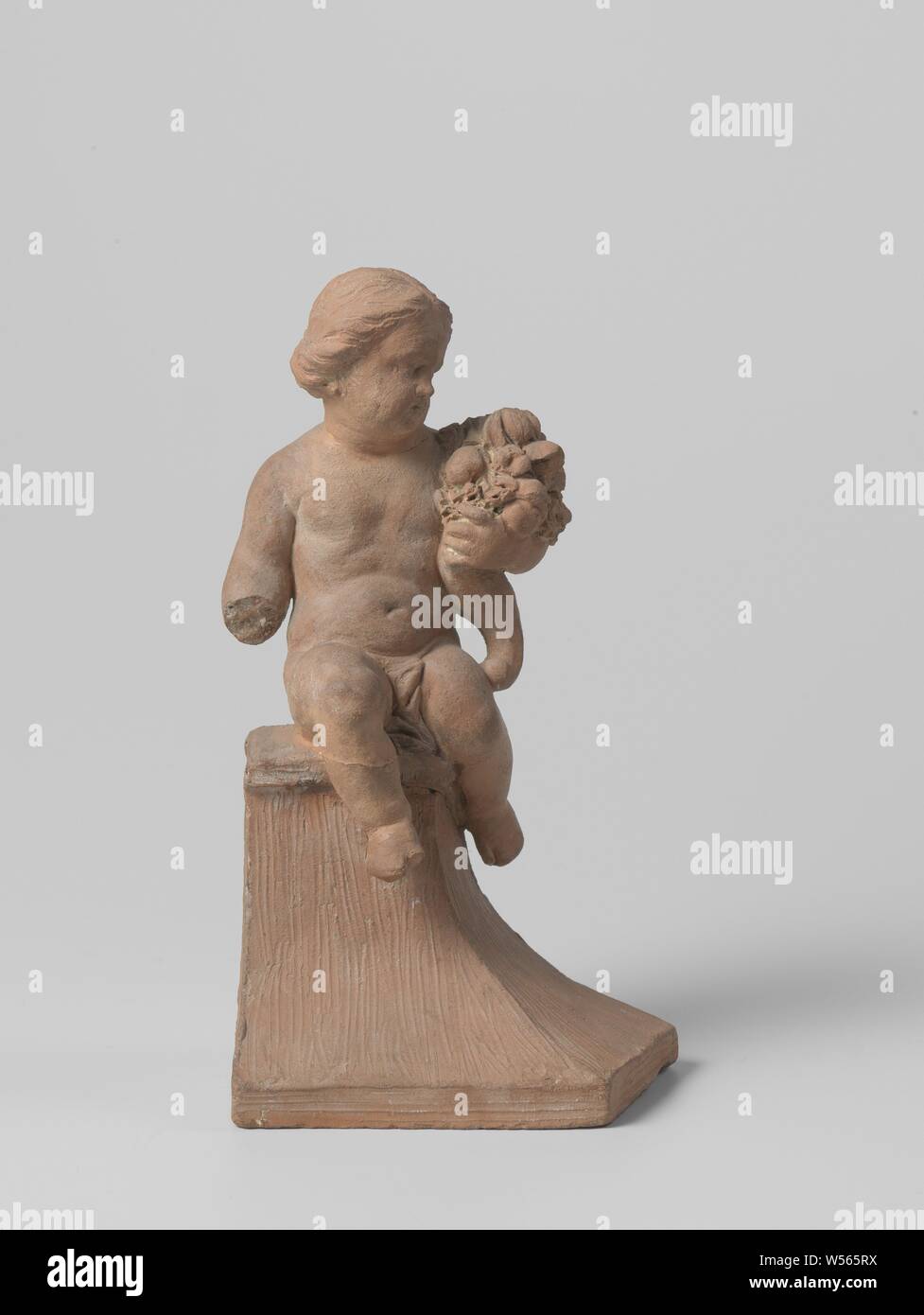 Season, presented by child with attribute, Northern Netherlands, 1725 - 1740, terracotta (clay material), h 19 cm × w 10.5 cm × d 8.5 cm Stock Photo
