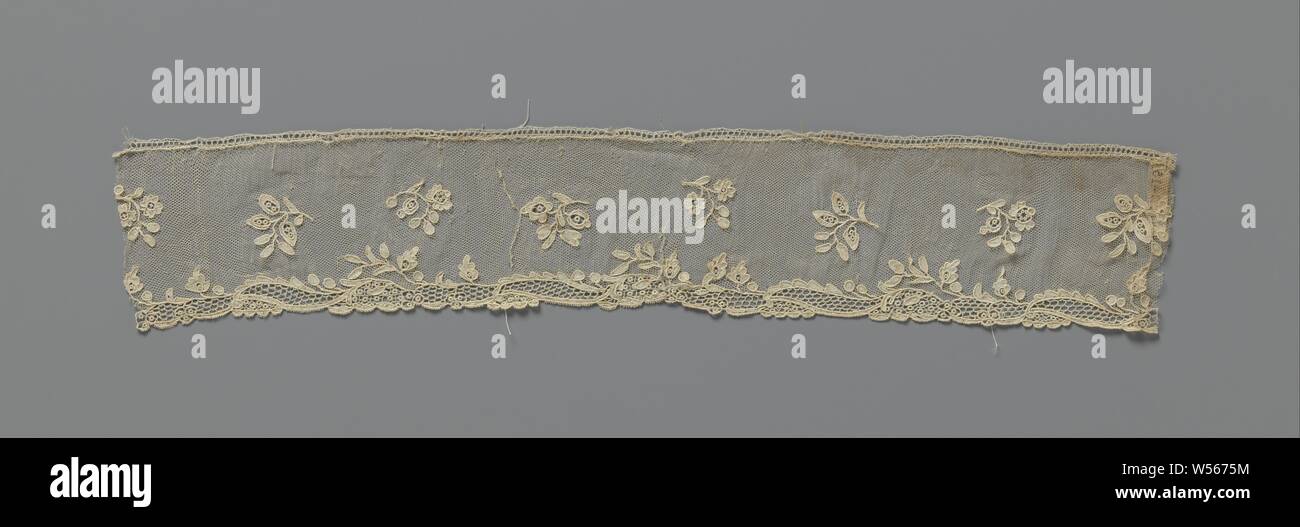 Strip of needle lace with sprinkled flower branches, Strip of ecru colored needle lace with a repetitive pattern of sprinkled short flower branches on a fine hexagonal mesh ground. The top is trimmed with a bobbin lace edge. A wavy line from which leaves spring forms the boundary between the mesh ground and the scalloped bottom edge. The underside of the strip consists of a wavy line from which leaves spring and a scalloped bottom edge. The waves are filled with different mesh grounds, decorated with, among other things, radar picots. Alençon side., anonymous, France, c. 1750 - c. 1774, linen Stock Photo