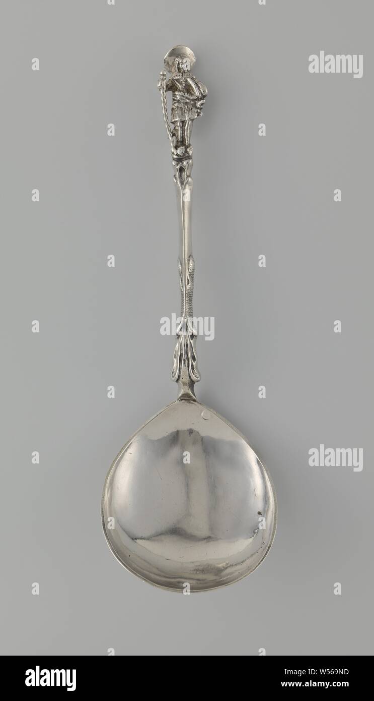 Spoon with pear shaped bowl and stem crowned by a man with hat and walking stick, Spoon of silver, with a pear shaped bowl. The stem is crowned by a man with a hat and walking stick. The letters G.D are engraved on the underside of the container. Brand: year letter L = 1795, Amsterdam., Claes Bel (possibly), Hoorn (North Holland), 1674 and/or 1698, silver (metal), l 17.4 cm w 5.6 cm w 50.0 Stock Photo