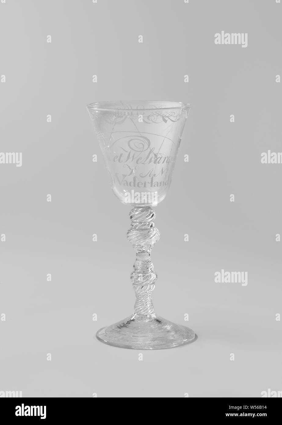 Sling glass with the inscription: The prosperity of the Fatherland, Conical foot. Double railing stem with two knots and multiple slings. Funnel shaped chalice with rounded bottom. On the chalice: The prosperity of the Fatherland. Signed on the foot: H. Lokhorst script 1753. Along the mouth rim a band with volutes and rolling., anonymous, 1753, glass, glassblowing, h 18.8 cm d 8.3 cm Stock Photo