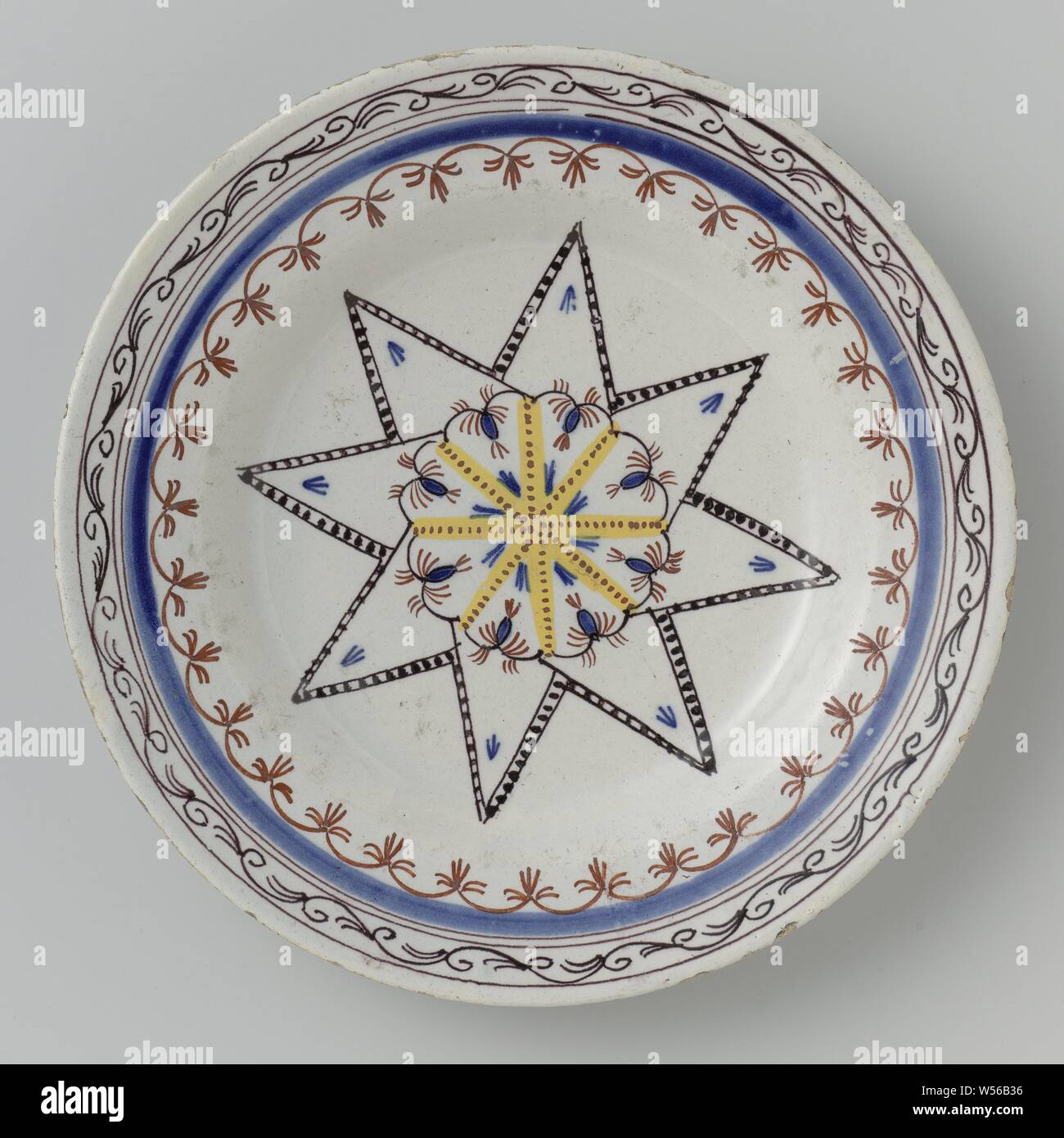 Plate of faience, Plate of faience. Multicolored painted with a star and decorated edges., anonymous, Delft, 1770 - 1800, d 22.7 cm × h 3.1 cm Stock Photo