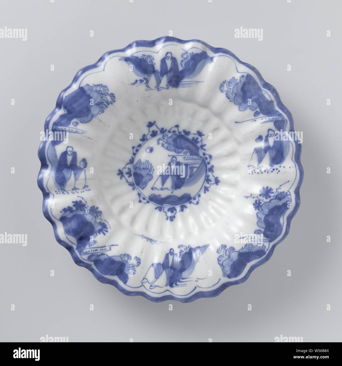Pleated dish of faience, Round pleated dish of blue-painted ...