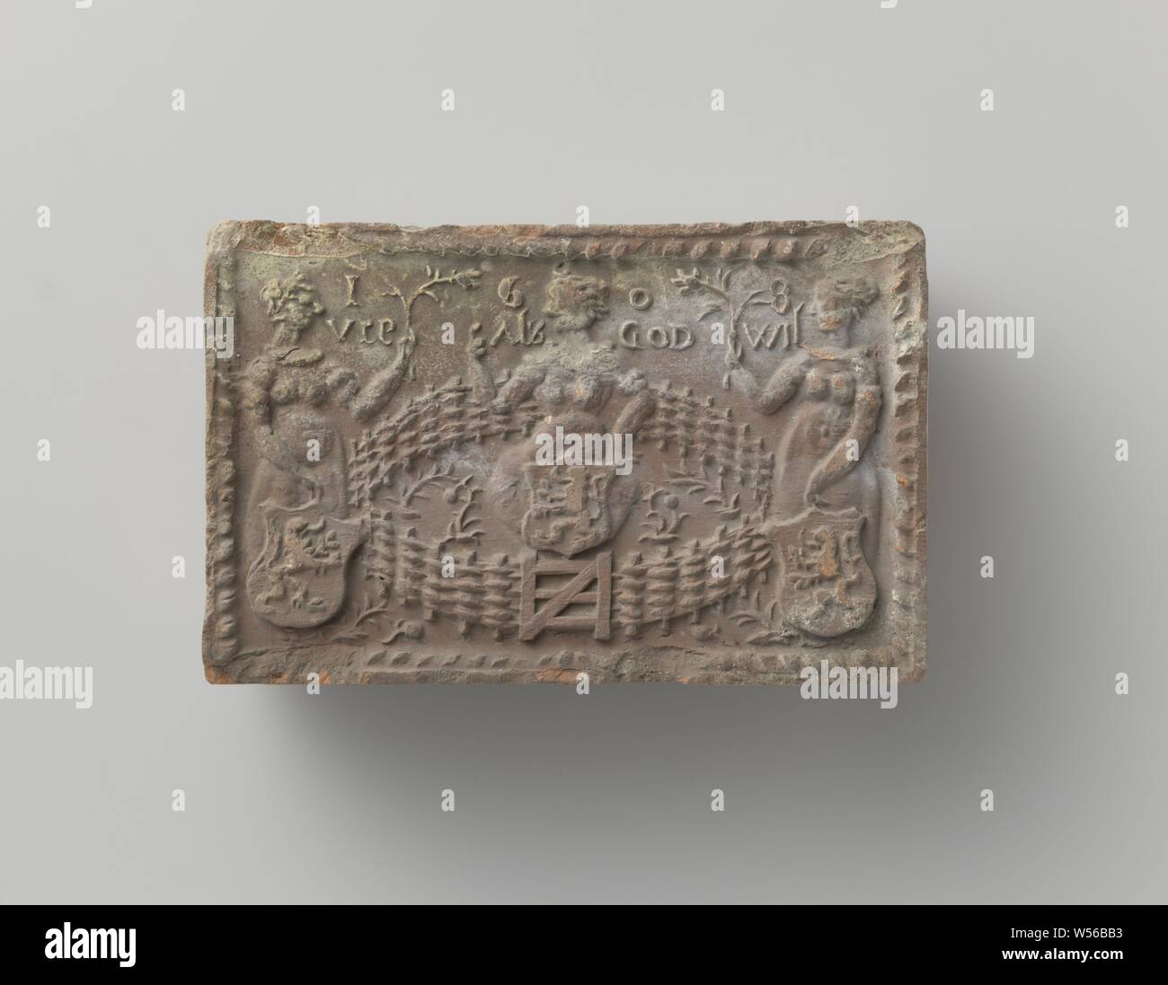 Fire brick with image, Fire brick, representing the Dutch virgin in the garden, next to which two virgins with blazon, with a lion and olive branches in their hand., anonymous, Southern Netherlands, 1608, earthenware, h 10.5 cm × w 16.0 cm × d 4.5 cm Stock Photo