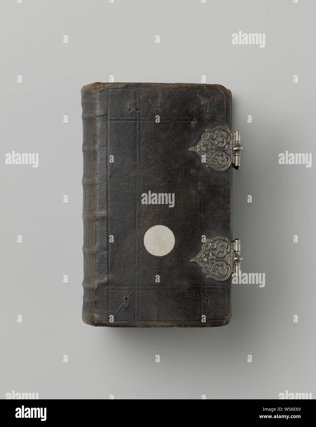 Bible with cast and worked-up small locks of silver, Bible with cast and worked-up small locks of silver. Leather band., anonymous, c. 1700 - c. 1800, paper, silver (metal), leather, h 14.5 cm × w 9.5 cm Stock Photo