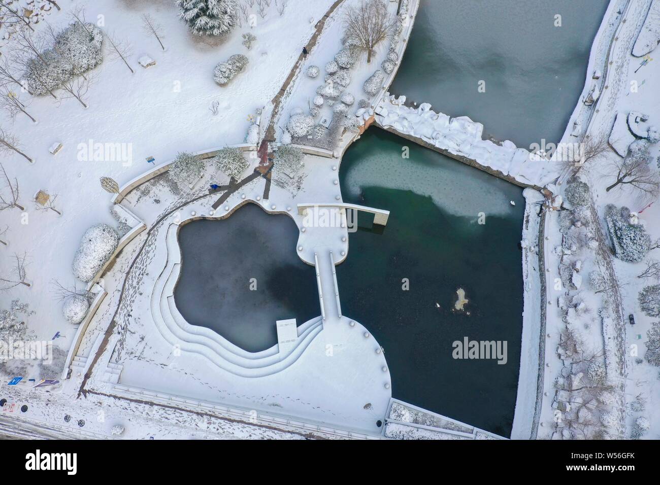Aerial view of snowcovered buildings after a heavy snowfall in Qingdao