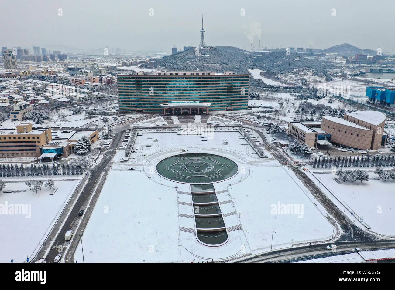 Aerial view of snowcovered buildings after a heavy snowfall in Qingdao