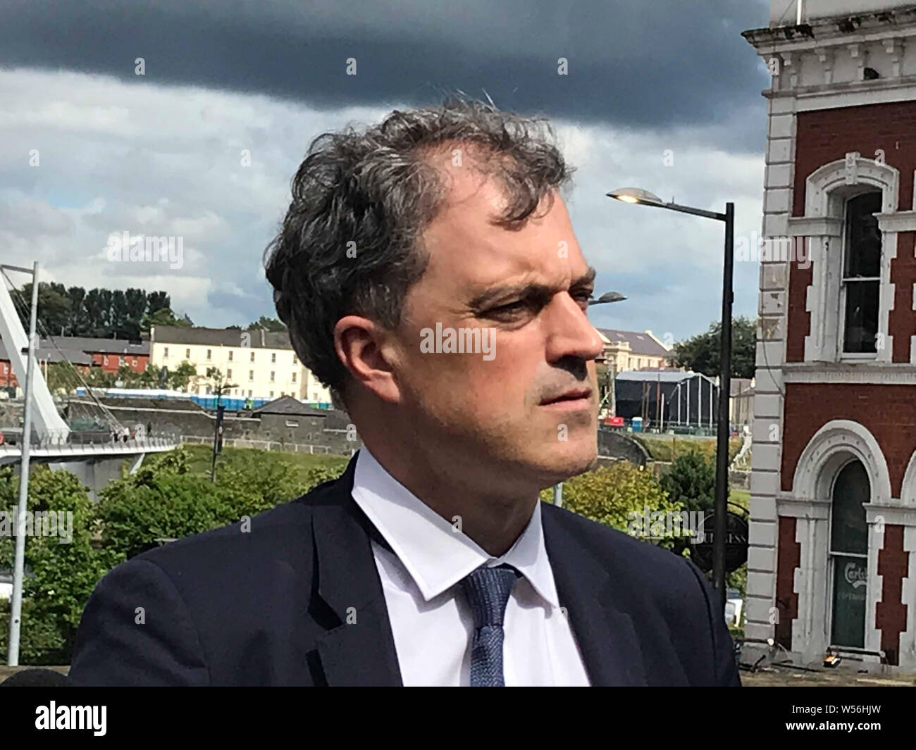 Northern Ireland's new Secretary of State Julian Smith speaks to media in Londonderry, following a visit to the city on his second day in the job. Stock Photo
