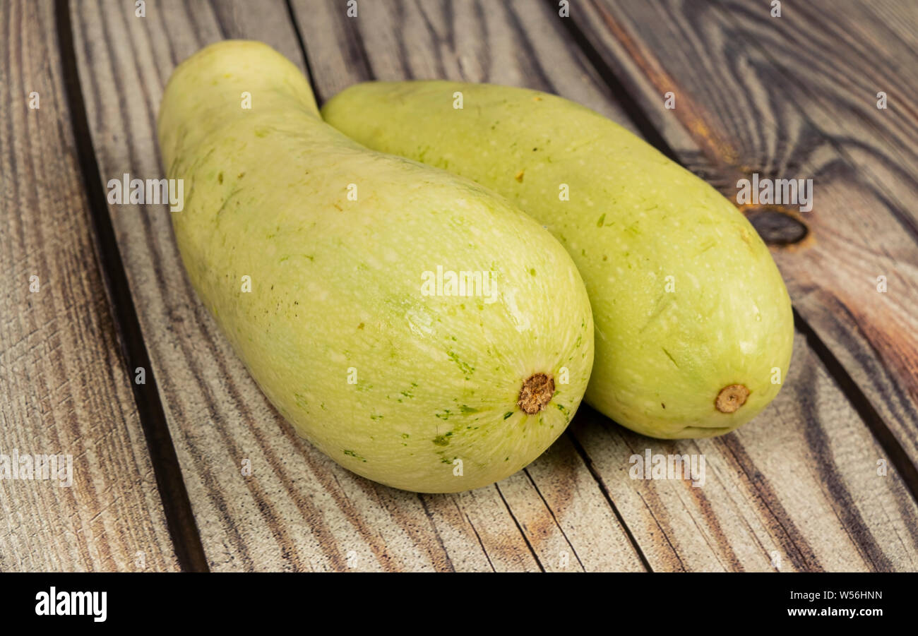 Zucchini on a wooden table. Autumn harvest thanksgiving Day Stock Photo