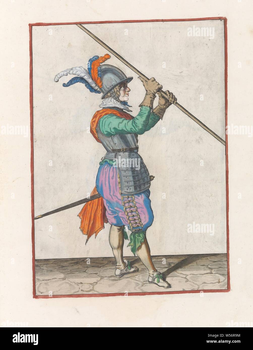 Soldier carrying his skewer with both hands close together above his right shoulder, the point pointed obliquely to the ground Soldaet int acting of the Spies noodich is (original series title), A soldier, full-length, to the right, who wears a spear (lance) above his right shoulder, the point slanting to the ground. His hands close together around the skewer. This is the first operation for lifting the skewer to the shoulder and carrying it horizontally. This print is part of the series of 32 hand-numbered prints of skewers in the Arms Act, handling of weapons, military training, helved Stock Photo