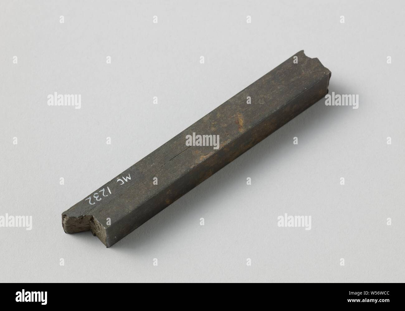 Sample of Steel, Sample of Heaton's steel, made from medium iron. It is a rod with a square cross-section of ½ English thumb, the ends broken off or torn., John Heaton, United Kingdom, 1868, steel (alloy), h 1.4 cm × w 10.3 cm × d 1.4 cm Stock Photo