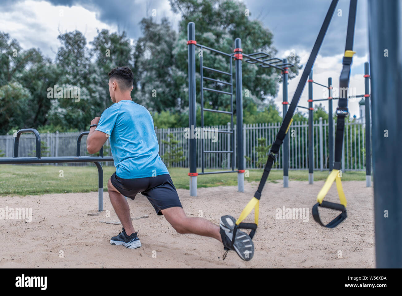 Spports Back Loop Guy stretching ball hi-res stock photography and images - Alamy
