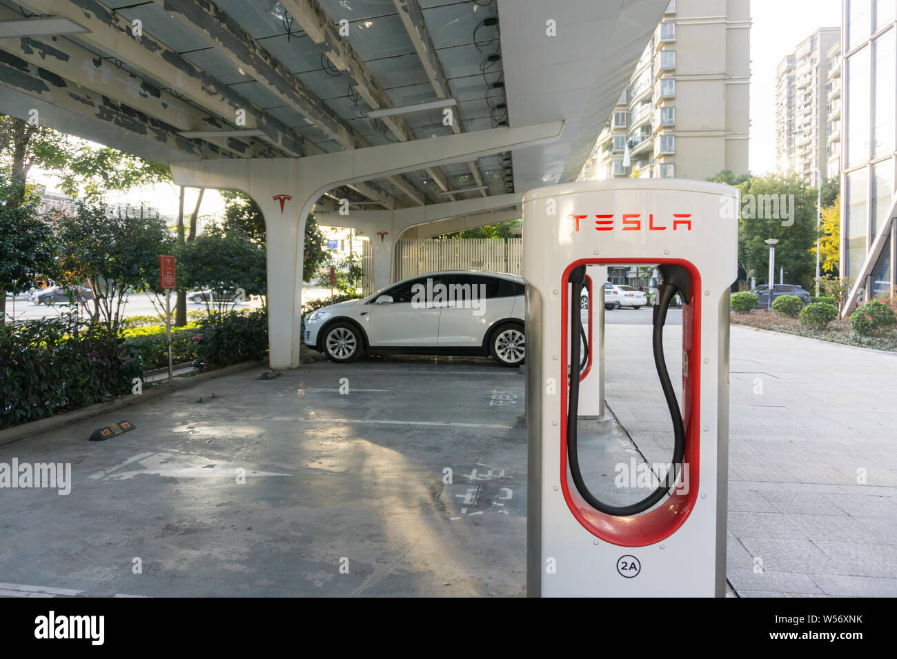 --FILE--A charging pile of Tesla is seen at a charging station in Shanghai, China, 24 November 2018.  American electric vehicle maker Tesla Inc. is ad Stock Photo