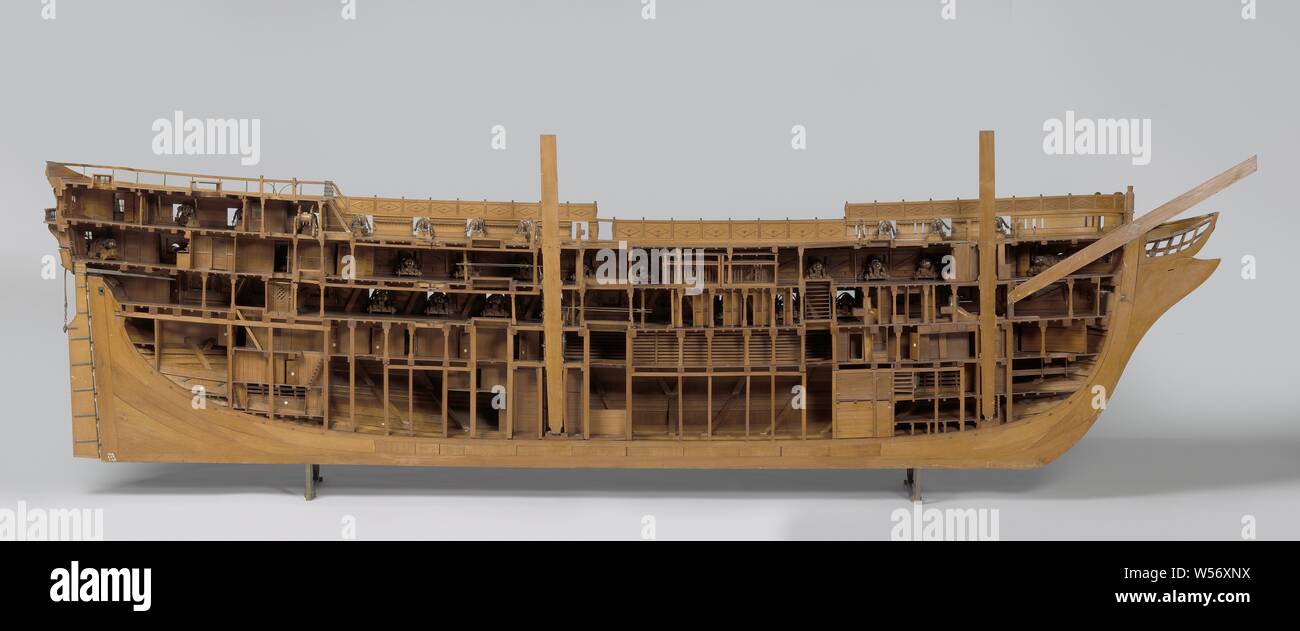 Model of an 84-Gun Ship of the Line (port side), Truss model of the hull (port side), cut lengthwise. The model is fully fired and extremely detailed. Seventy-six cannons and carronades have been preserved, the model has ninety-six gun ports spread over three decks. Five levels: cow bridge with locally lower levels, lower deck, intermediate deck, closed box and half deck with covered pit, upper campaign with two oval roses, all shot at with doors, stairs, cupboards, cages etc. The figurehead is a crowned walking man (Neptune), the galleon is decorated with sea attributes and has eight Stock Photo